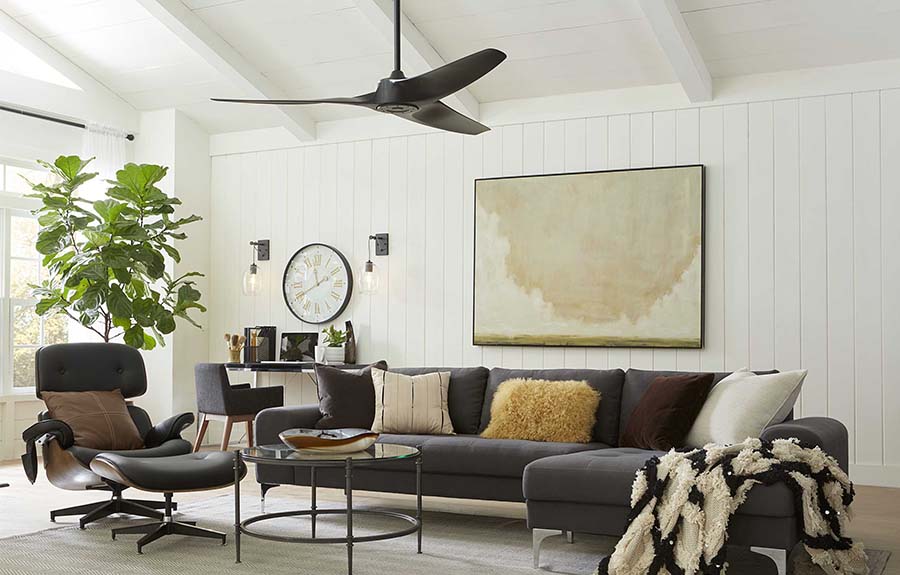 sleek and modern living room with black finish ceiling fan